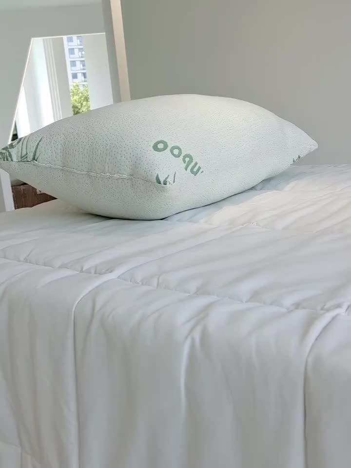 Set of 2 High-Quality Bamboo Pillows Designed to Keep You Cool, Featuring an Instant Cooling Effect And Moisture-Wicking Properties, Ideal for Those Who Sleep Hot. Available in Two Color Options, They Are Both Soft And Supportive